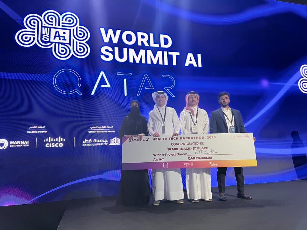 ATF team with ceremonial check on the World Summit AI Qatar stage