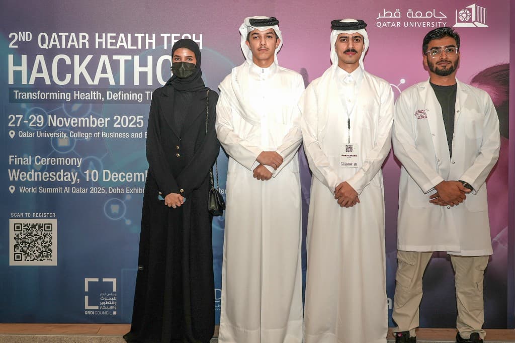 ATF team at the 2nd Qatar Health Tech Hackathon banner during AI World Summit Qatar 2025